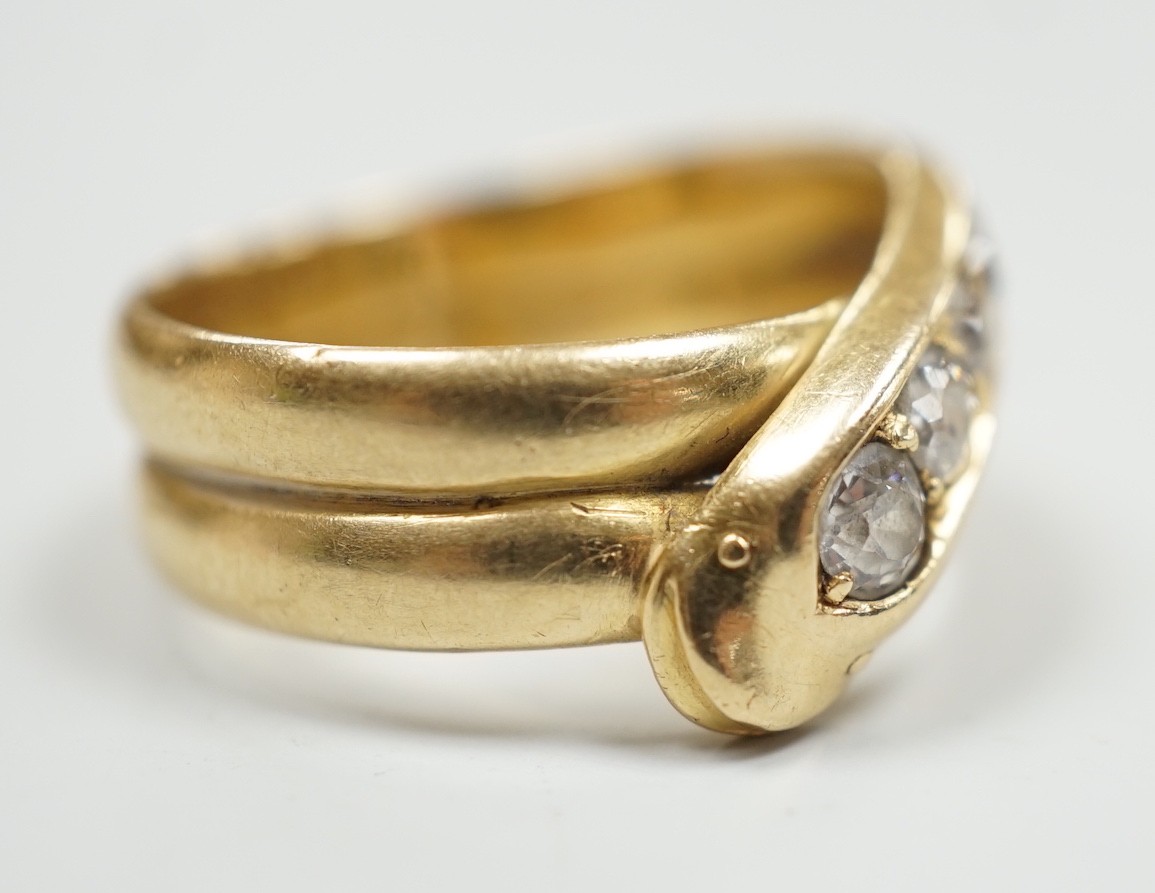 A late Victorian18ct gold and graduated five stone diamond set serpent ring, Hallmarked for Chester, 1897, size P/Q, gross weight 7.3 grams.
